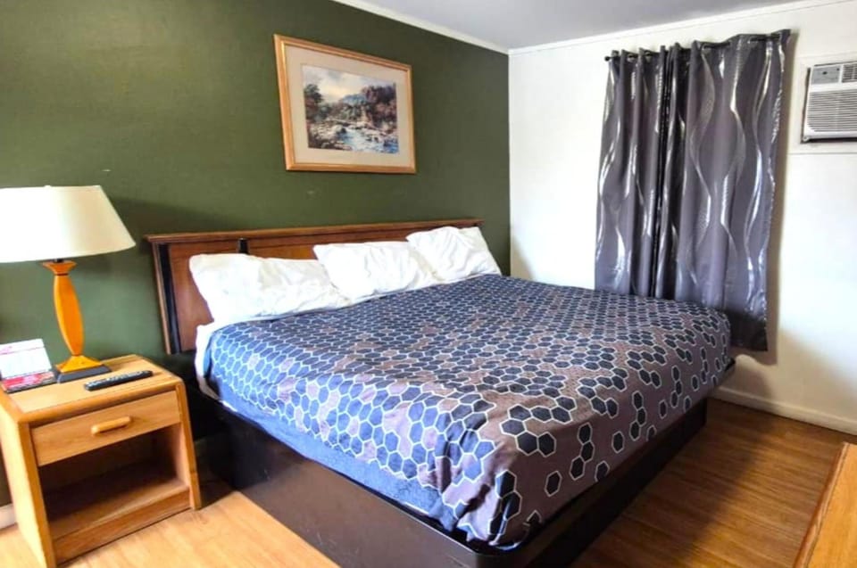 Drift off comfortably in a spacious queen bed retreat.