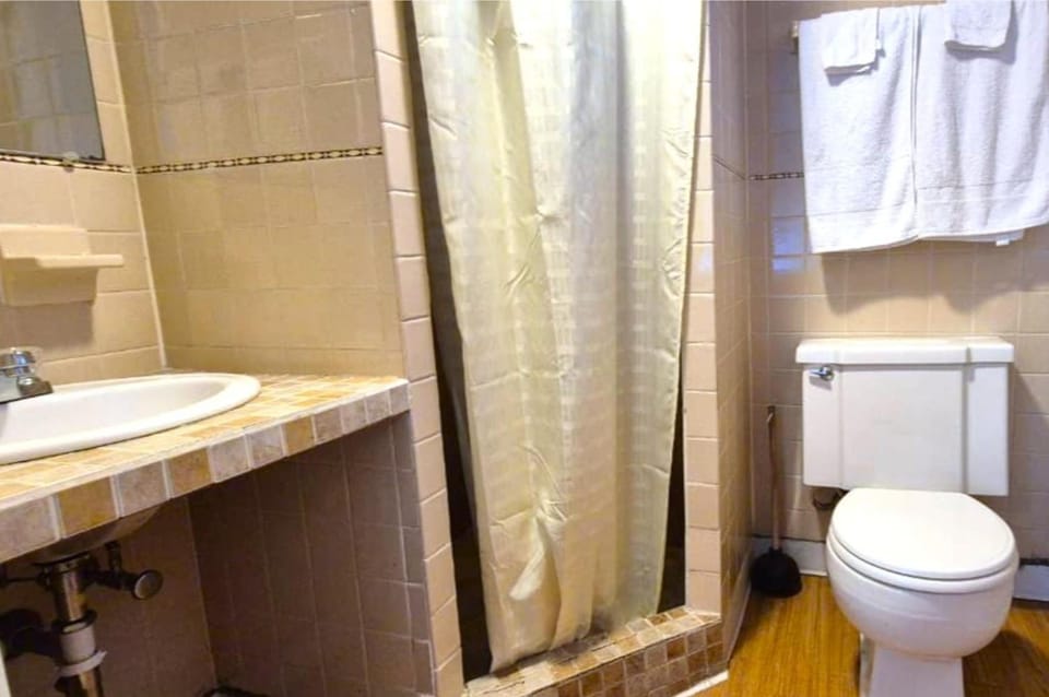Refresh after adventures in a private, tiled walk-in shower.