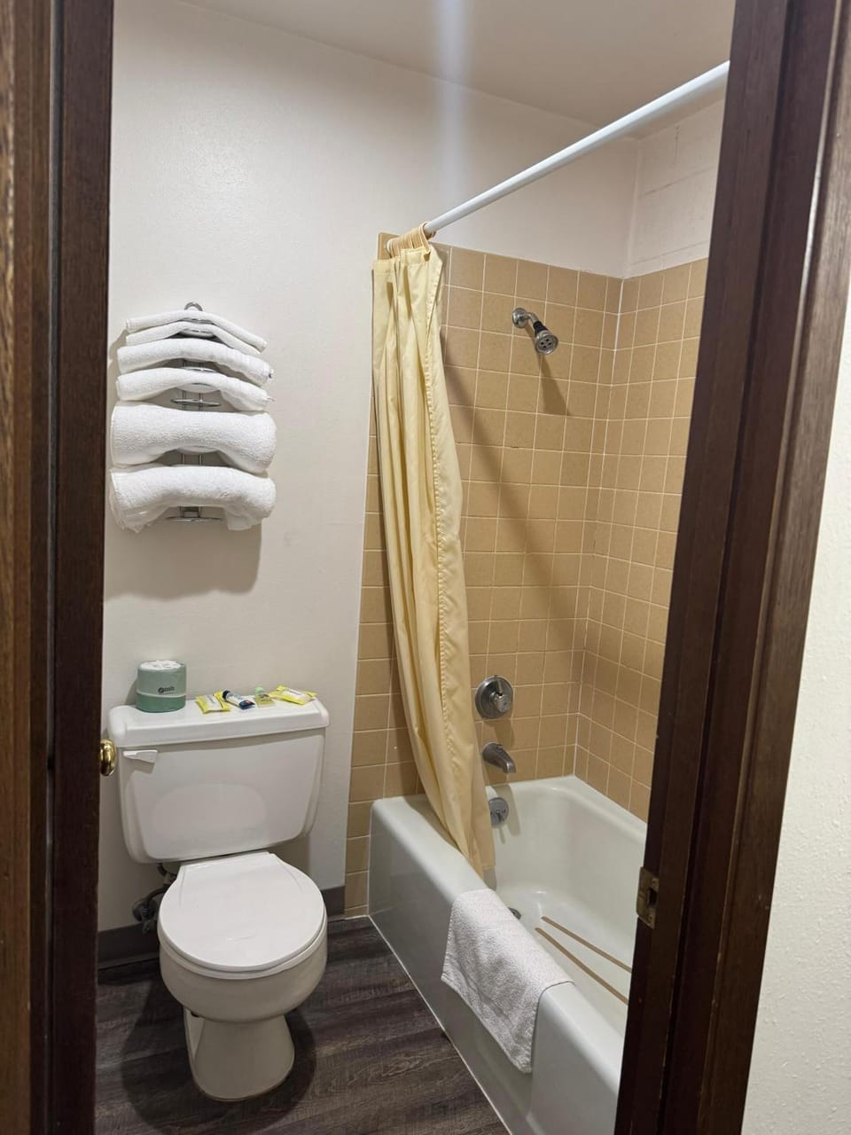 Rinse off comfortably with a straightforward tub-and-shower space.