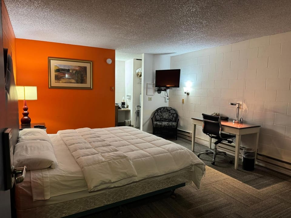 Settle in comfortably with a roomy bed and work desk.