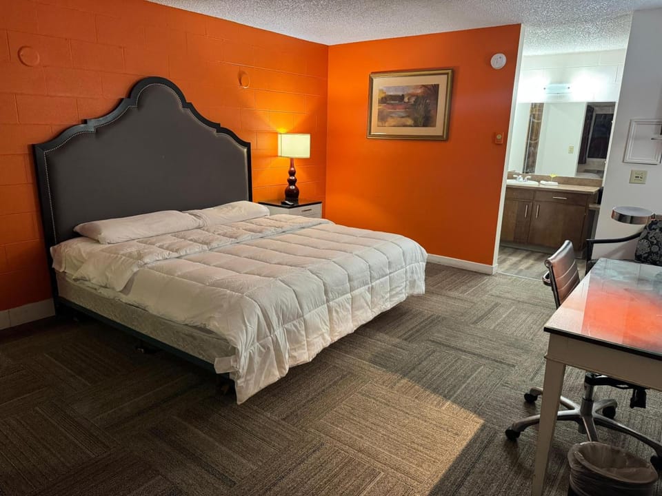 Relax into a cozy, well-lit bed for restful nights.
