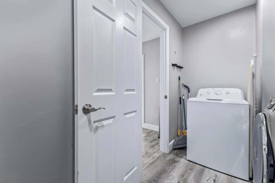 Convenient in-home laundry area with washer and dryer.