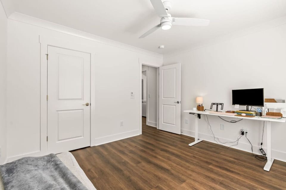 Third bedroom has a desk for working and ceiling fan - twin bed coming soon!