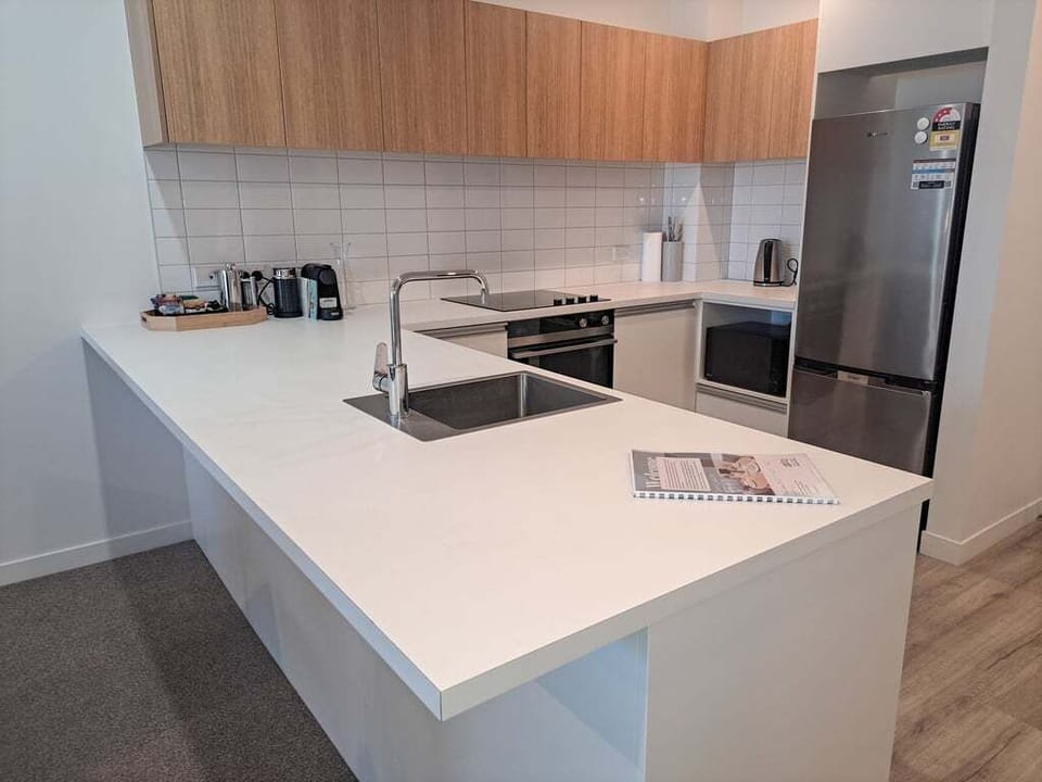 Arrive to a sleek, fully equipped kitchen designed for easy meals