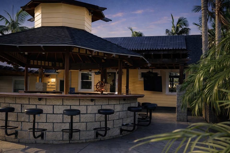 The view of our outdoor bar, featuring the large screen TV. 