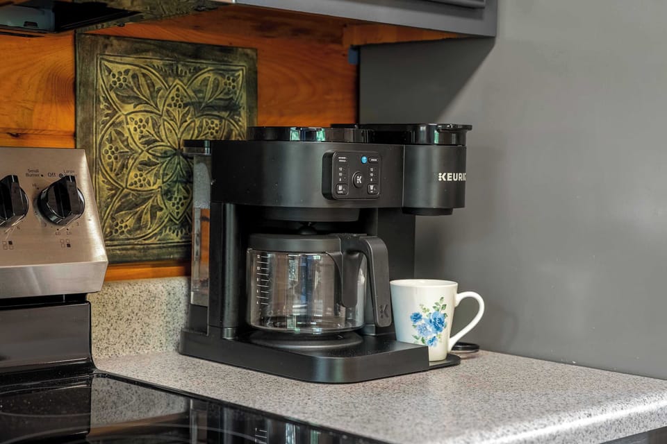 First one up makes the coffee — Keurig or carafe, your mountain morning starts right here.