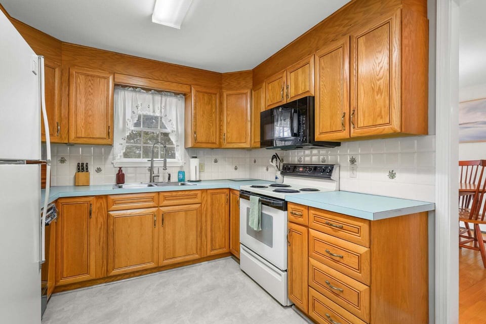 A spacious, well-maintained kitchen with ample room to cook