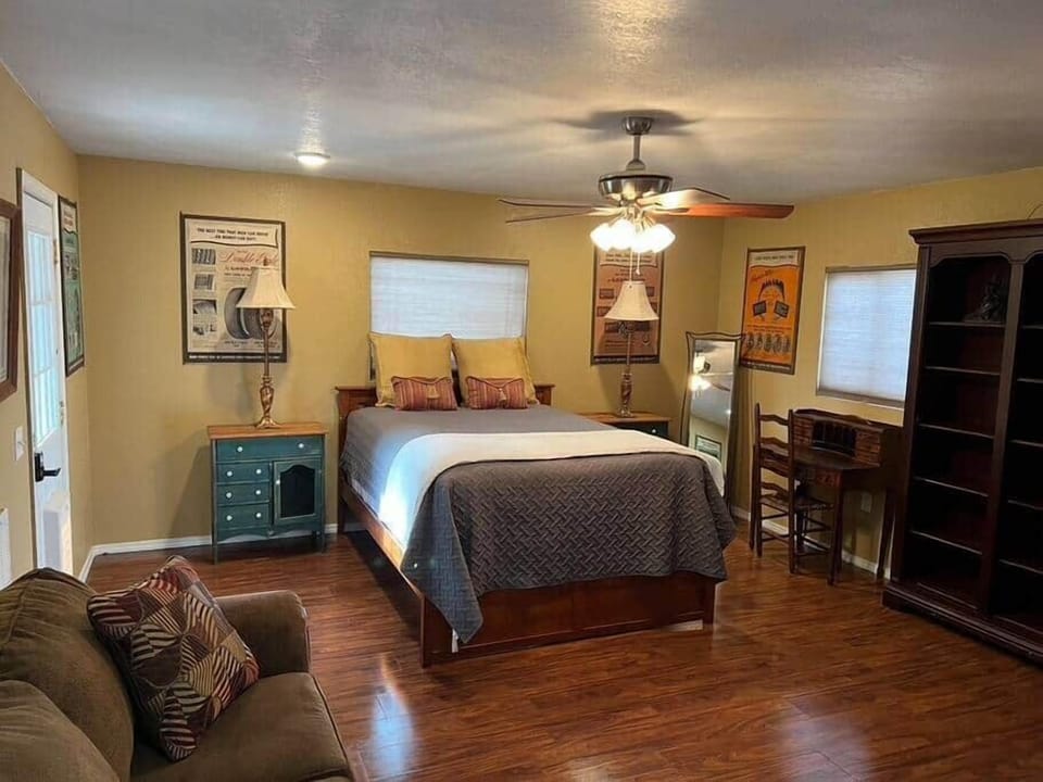 Bedroom 4 features a queen bed, sofa, and crib. 