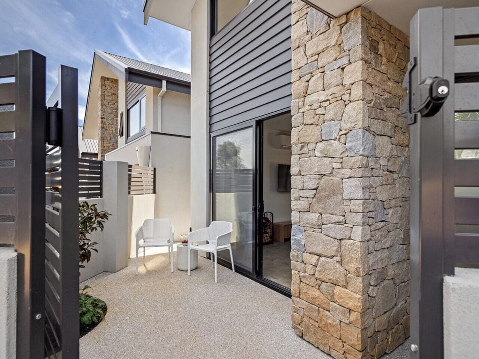 Outdoor Seating Area & Front Entrance Door