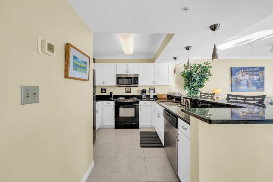 A thoughtfully laid-out kitchen with generous counter space and seamless flow for easy meal prep.