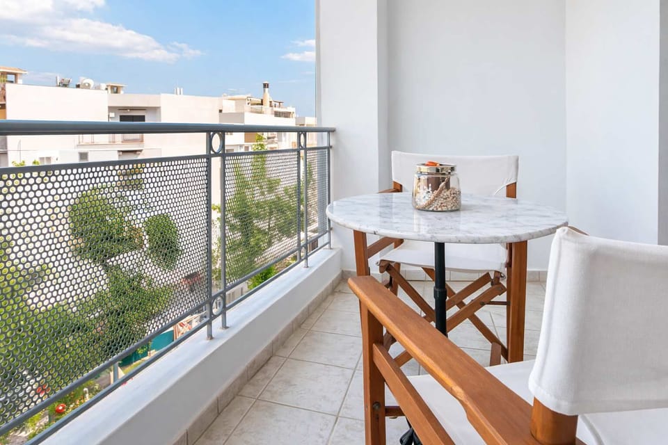 Private balcony with outdoor seating, ideal for enjoying your morning coffee or unwinding in the evening while taking in the peaceful surroundings