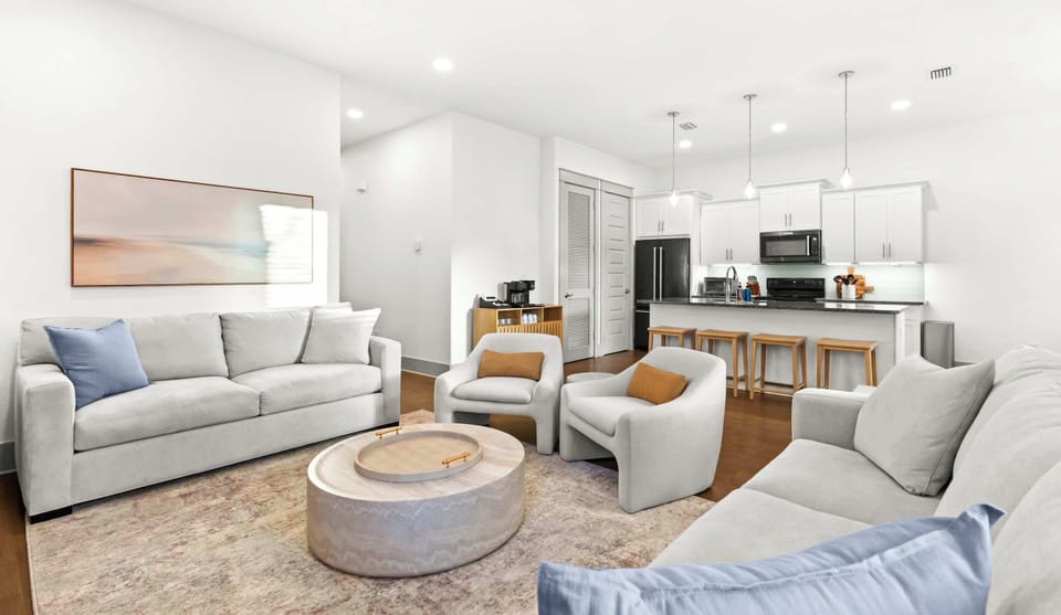 Living Room: Spacious seating with 75" Smart TV. 