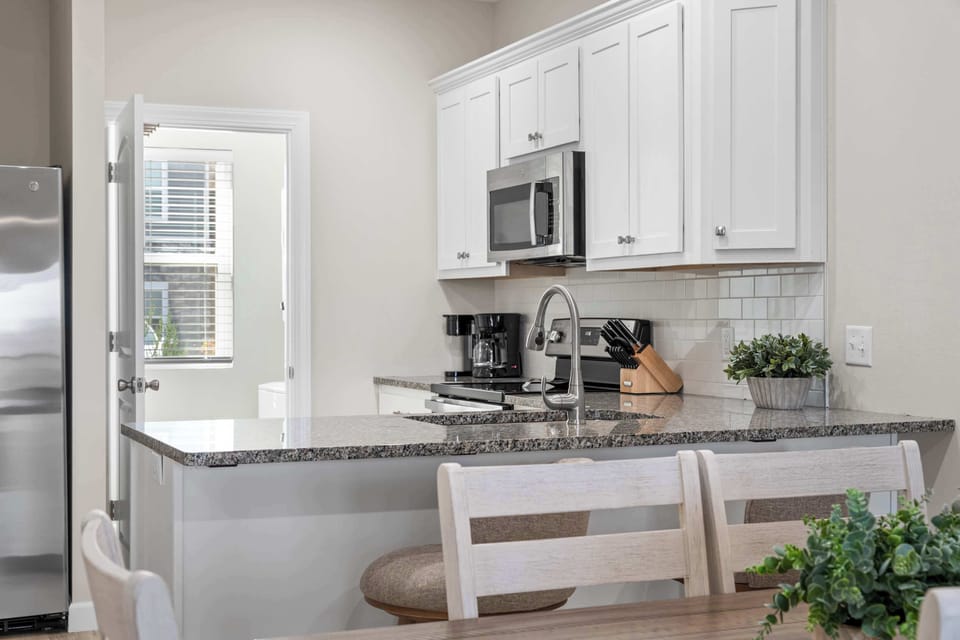 The cabinets are full of all the cookware you need to make your favorite meal!