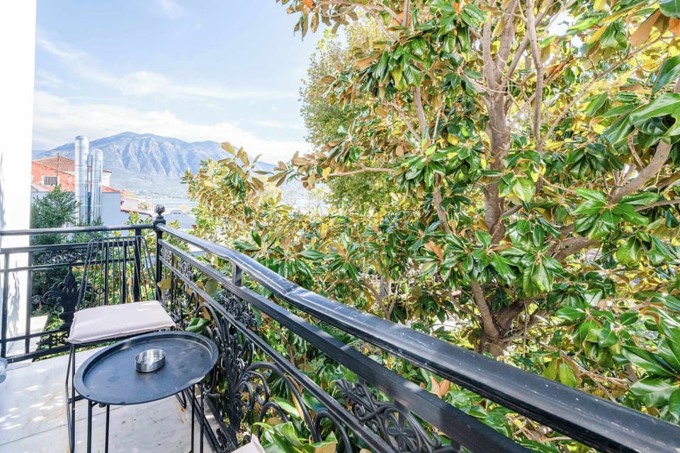 Balcony Surrounded by Trees with Relaxing Atmosphere gazing upon the Mountain of Taygetos