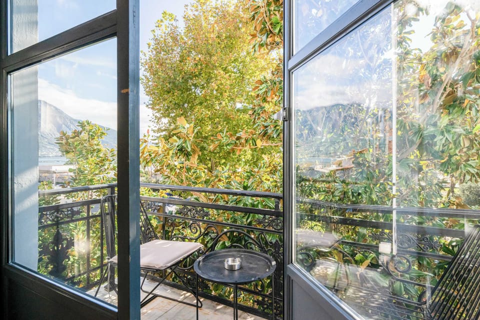 Bright Interior with Balcony and Green Surroundings