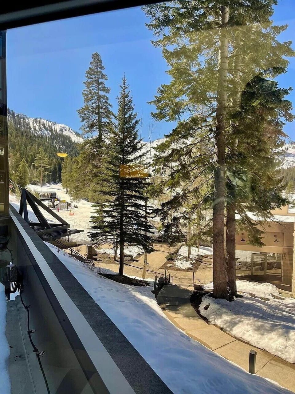 View toward Palisades Tahoe. The Resort chairlift is in the lower left
