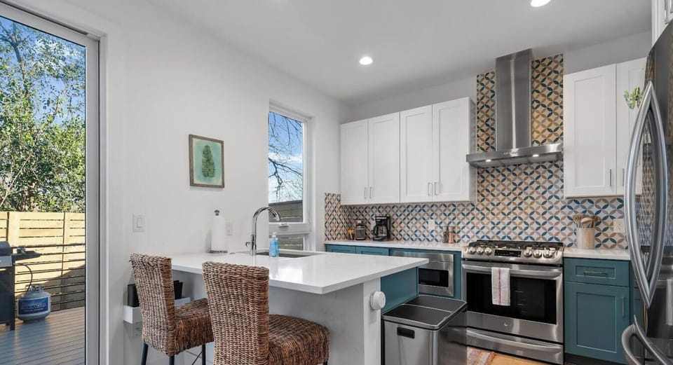Cook like a local in the fully stocked kitchen with gas range and ample counter space.