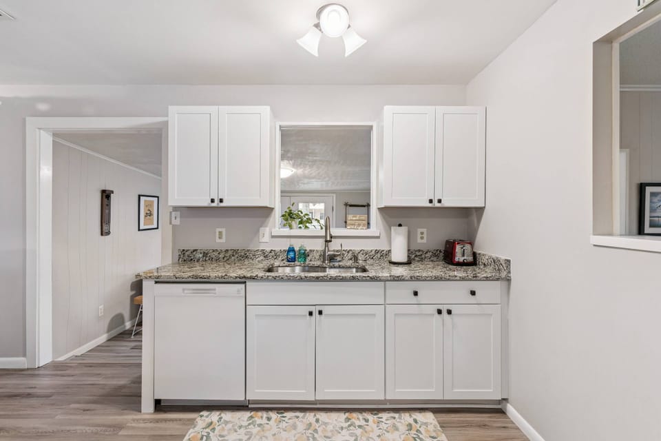 The fully stocked kitchen has everything you'll need while staying in your home away from home.