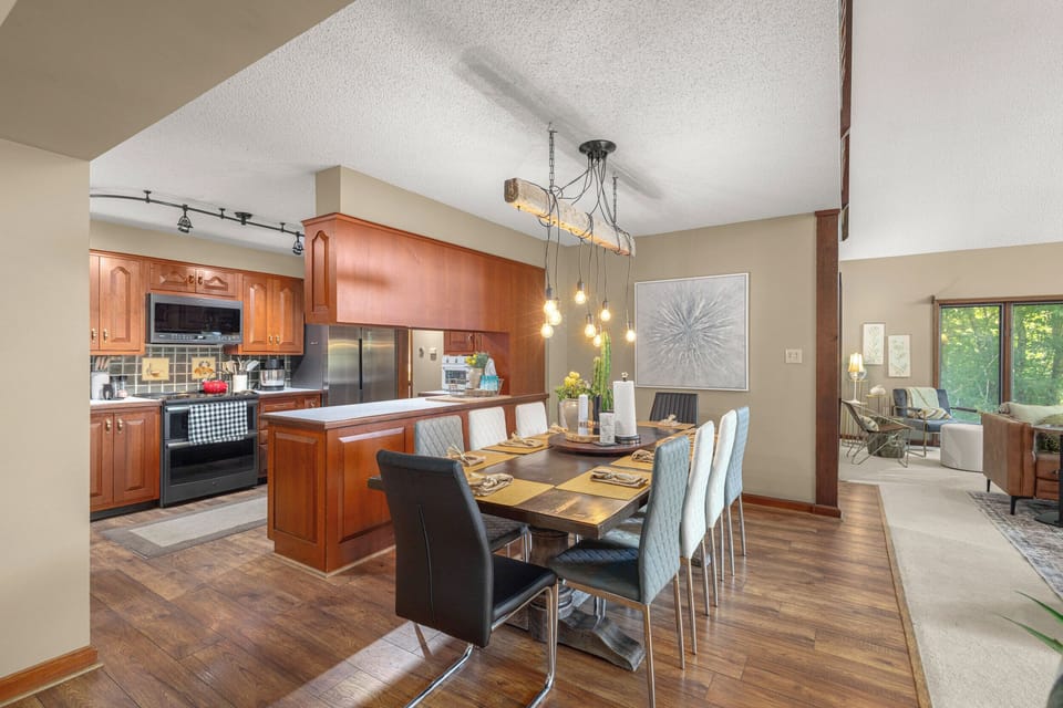 The open floor plan making the dining and kitchen areas accessible to all. 