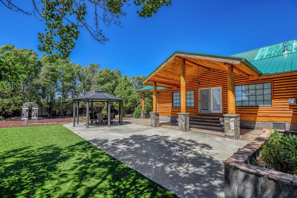 Outdoor Gazebo & Grill: Enjoy mountain views while dining al fresco in your private backyard.