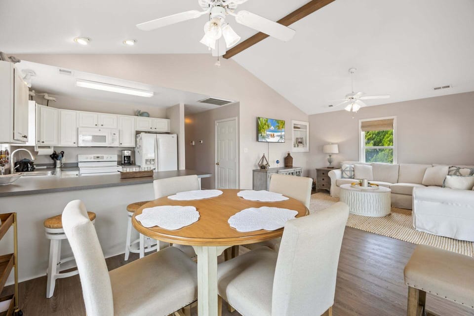 Enjoy meals together in a sunlit space just off the kitchen.