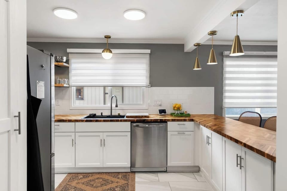 Delightful kitchen with smart lighting.  "Hey Google, turn on the island lights."