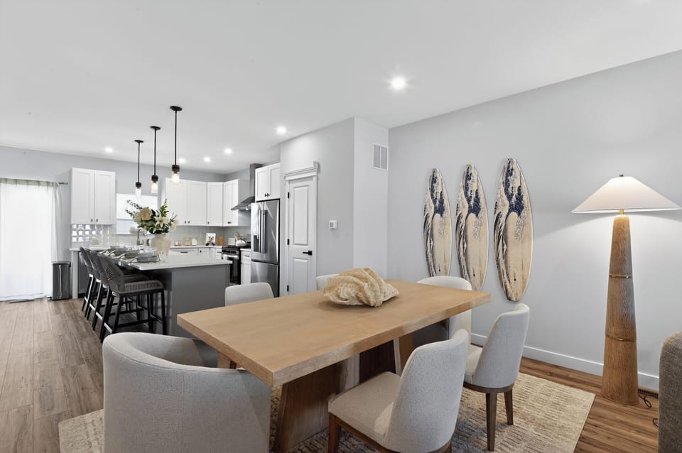 Dining room with seating for family & friends at table.