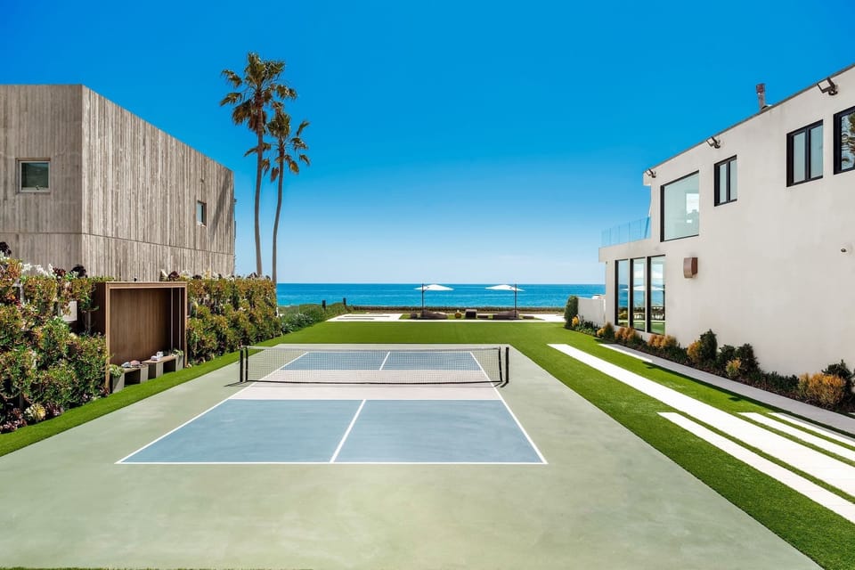 Play on your private sport court with the oceanfront just beyond the net.