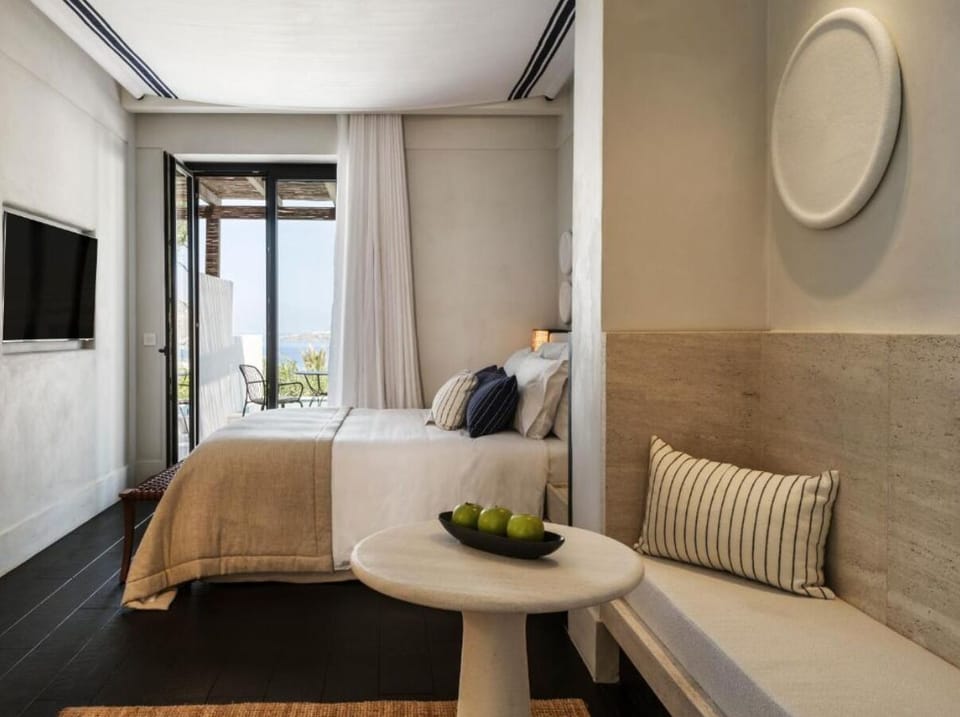 Wake up to bright coastal light and a breezy terrace.