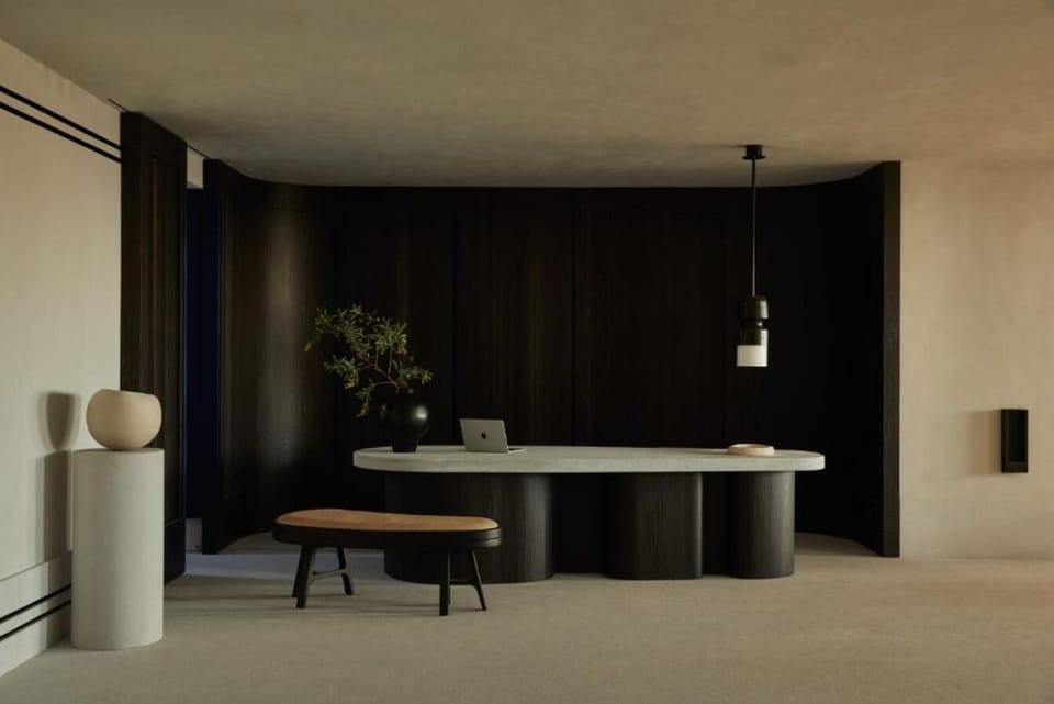 Settle into sculptural calm in this minimalist, design-led lounge.