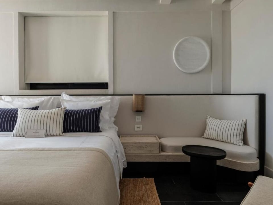 Drift off comfortably with thoughtful bedside details and muted tones.