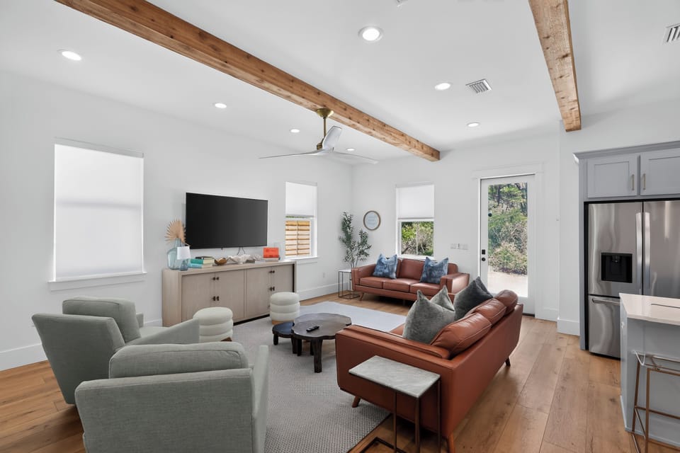Bright, beautifully designed living space with coastal-inspired finishes and an open flow into the chef’s kitchen.