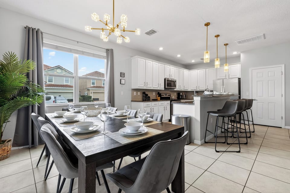 Transition seamlessly from dining to the kitchen area.