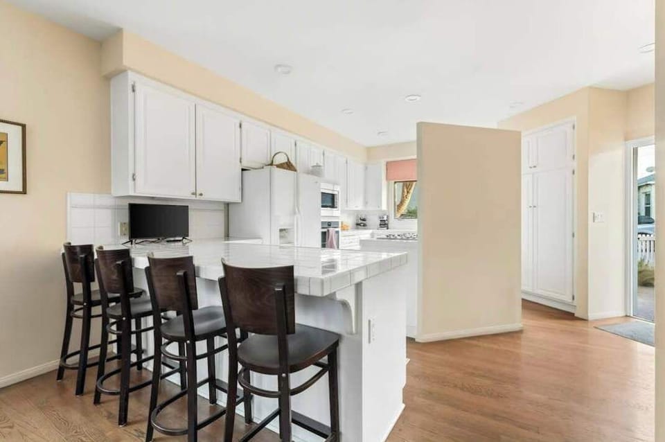 Modern kitchen layout with island seating.