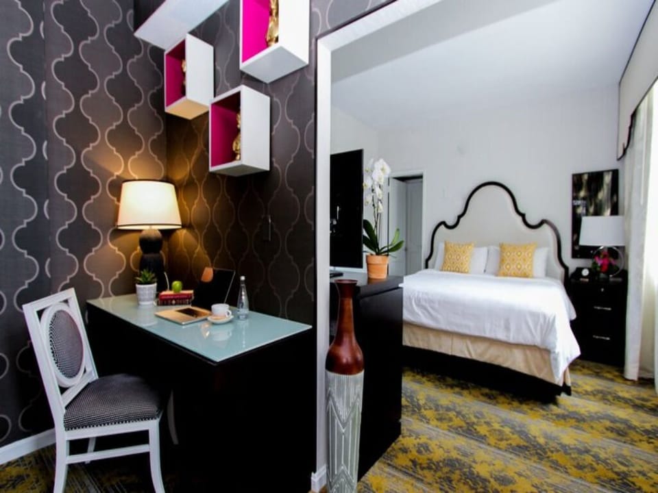 Ease into evenings with a cozy suite layout and warm lighting.