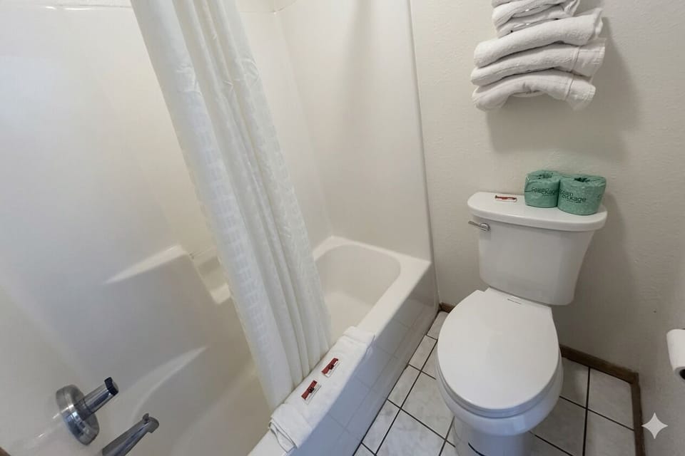 Refresh easily in a spotless tub-and-shower combination.