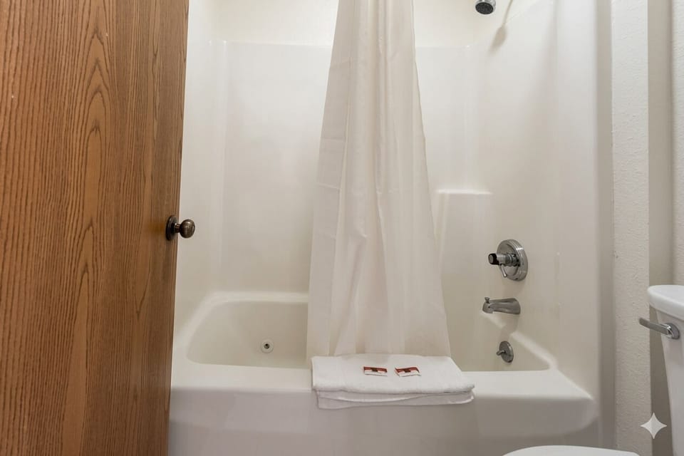 Rinse off comfortably with bright lighting and simple amenities.