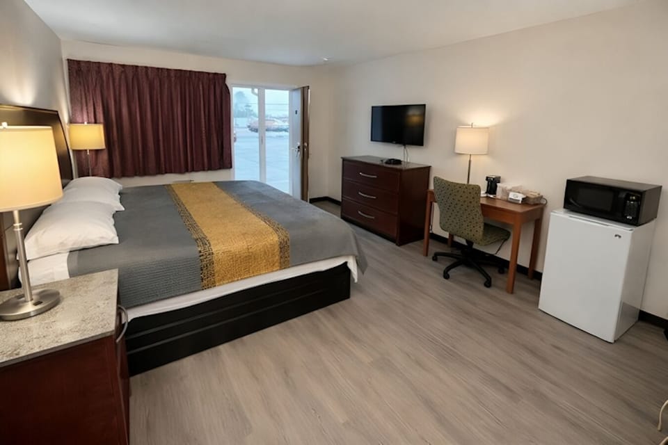 Enjoy easy in-room dining with microwave and mini fridge.