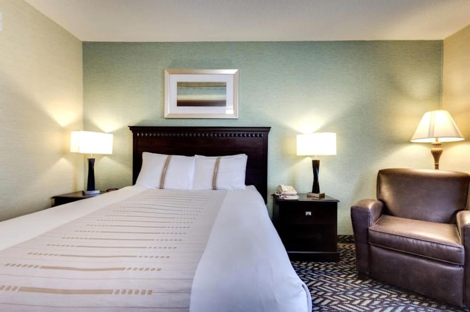 Sink into crisp linens and recharge in quiet comfort.