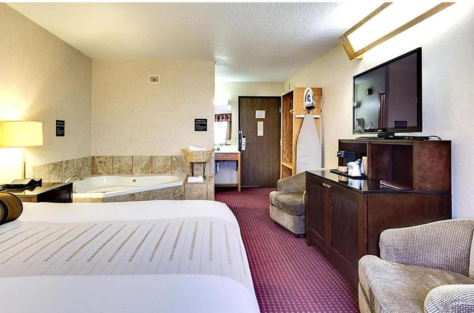 Unwind in a spacious suite with soothing in-room whirlpool.