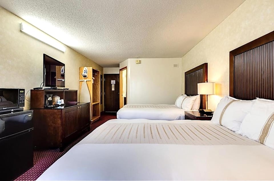 Unwind on plush double beds with easy in-room essentials.