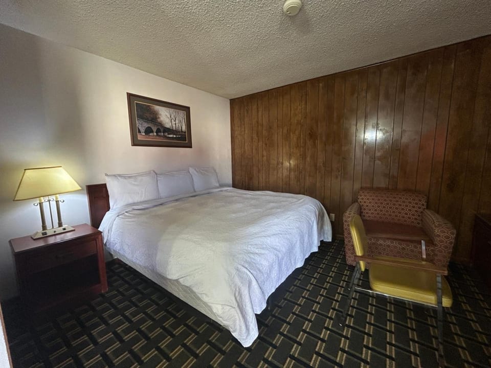 Unwind in crisp linens after a long day exploring.