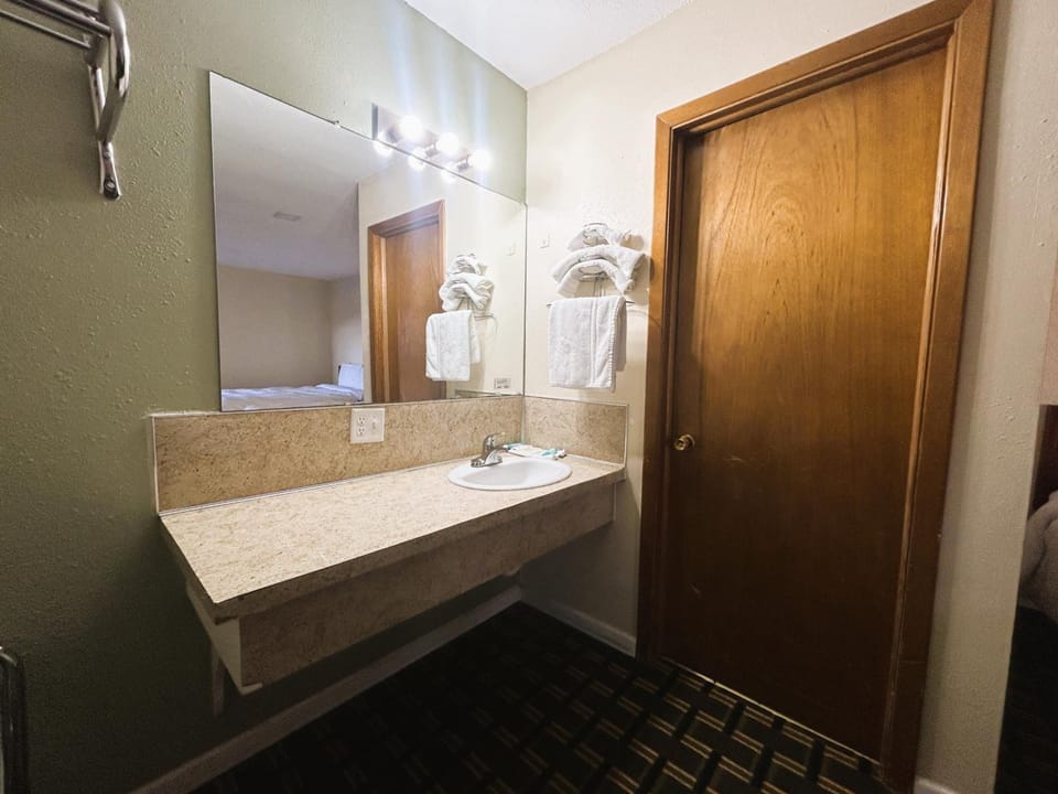 Refresh at the bright vanity with plenty of counter space.