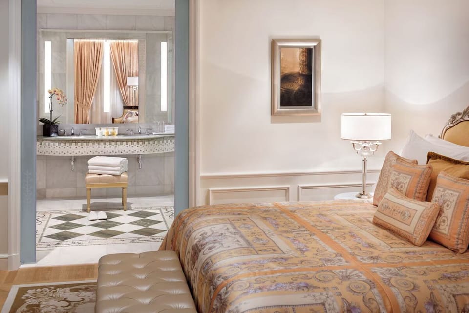 Wake gently with a serene bedroom-to-spa bath flow.