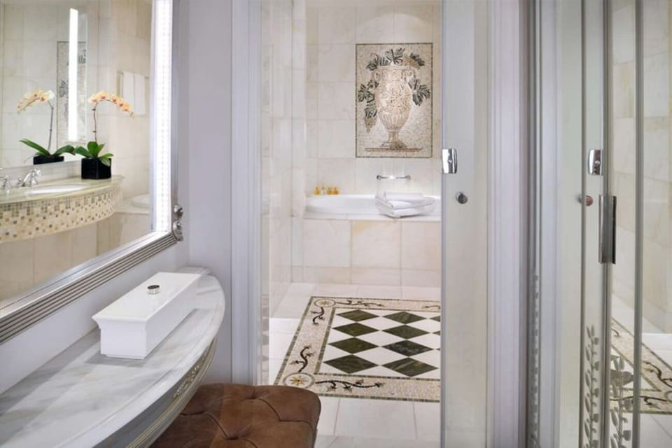 Refresh in a bright marble bath with spa-like calm.
