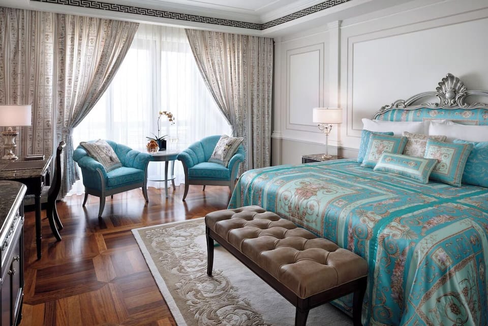 Sink into a lavish king bed dressed in elegant linens.