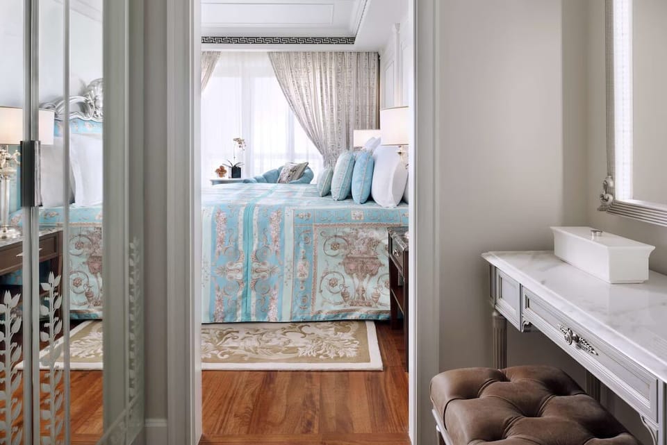 Prepare for the day at a sleek vanity with bright lighting.