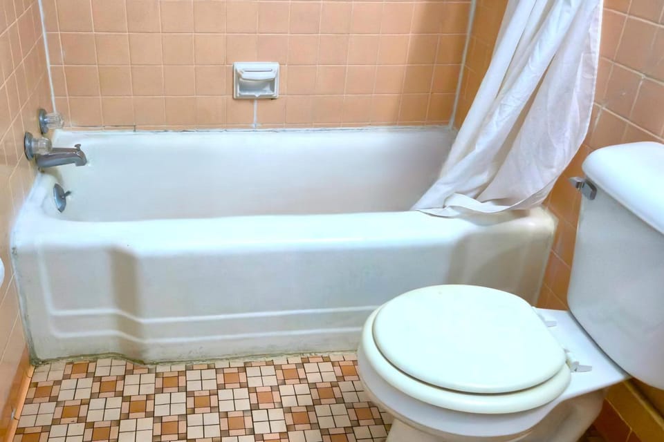 Refresh with a full tub-and-shower setup for easy rinsing.