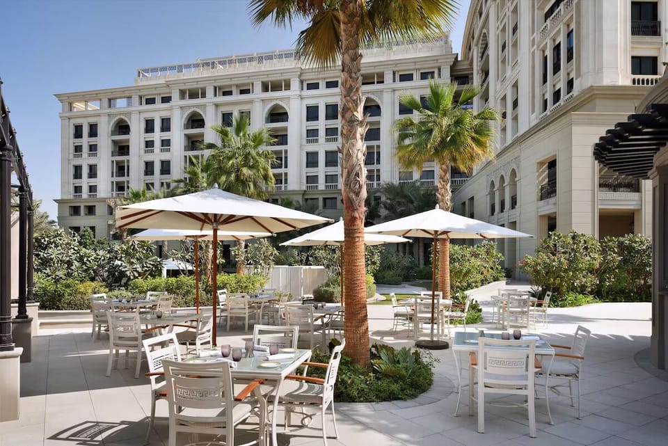 Sip coffee outdoors with grand architecture as your backdrop.
