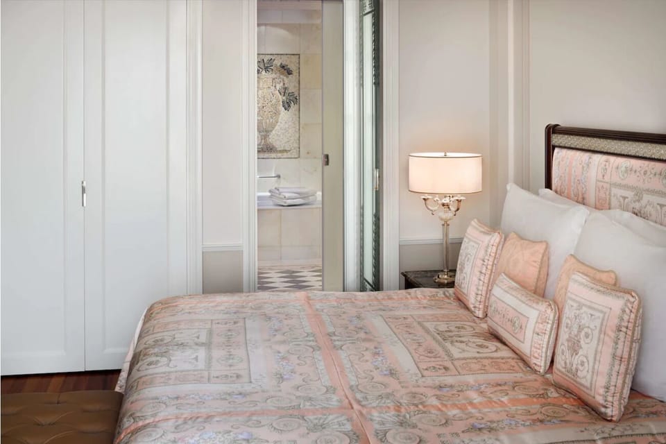 Sink into crisp linens after a day of exploring.